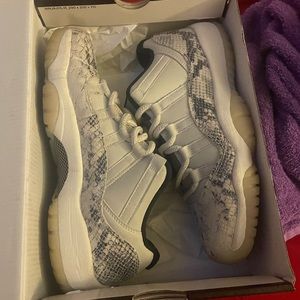 Snakeskin low 11s size 7